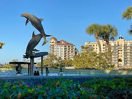 image - FGCVacation Rentals Dolphin Statue